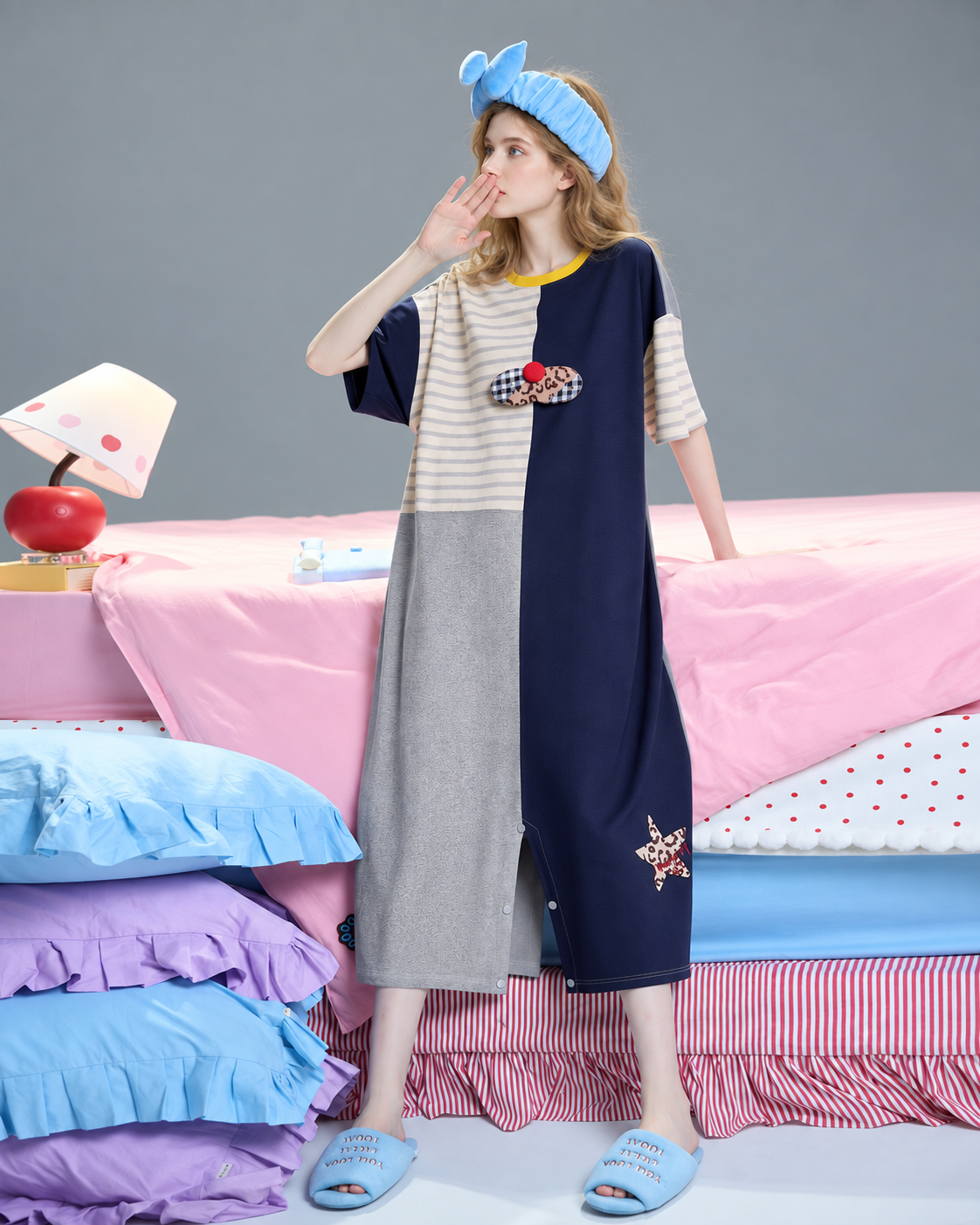 Patchwork one-piece pajamas – standing beside a pink bed - Roomden