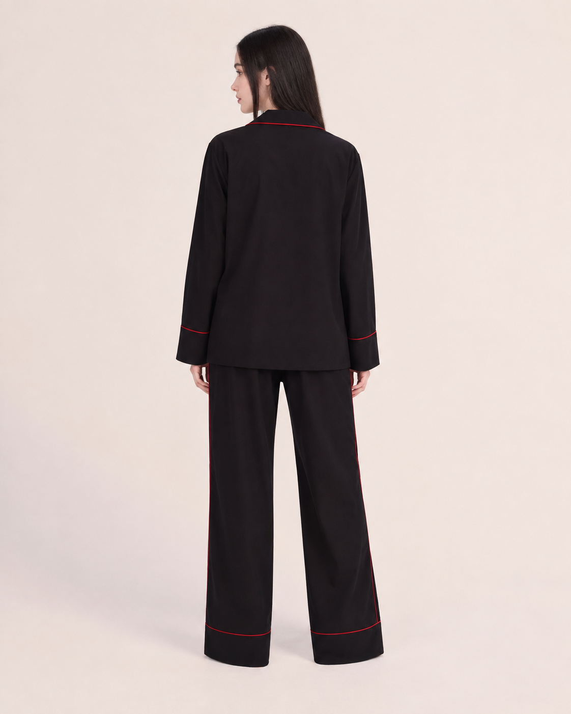 Linehaven contrast-piped pajama set in black, back view - Roomden