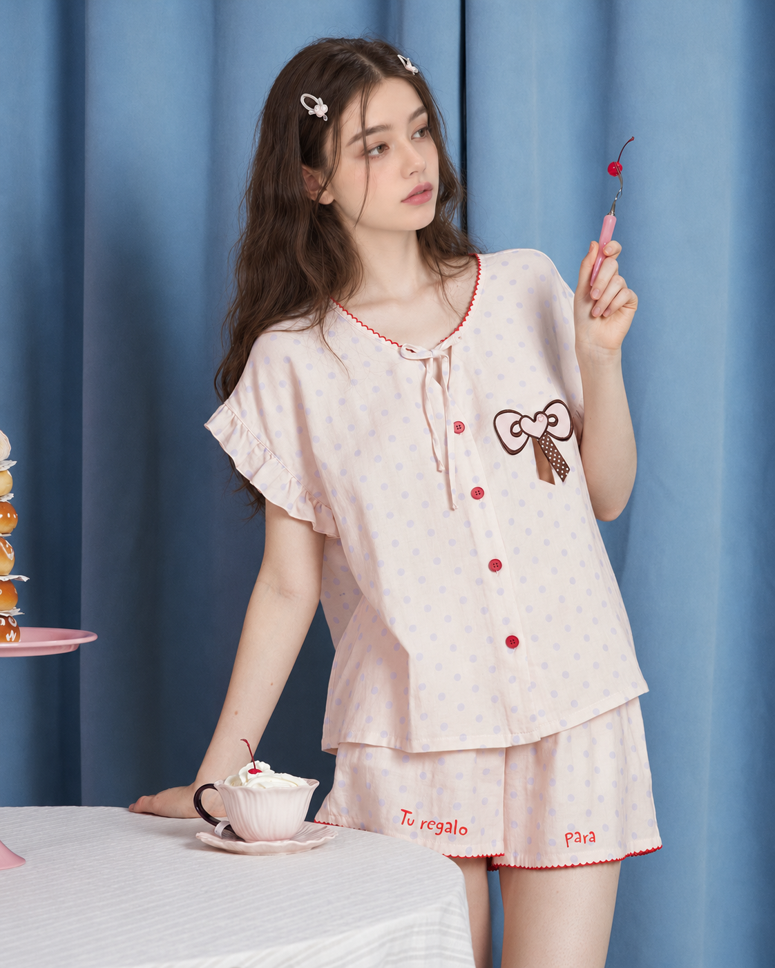 Button-front pajama top and embroidered shorts at a table - Roomden
