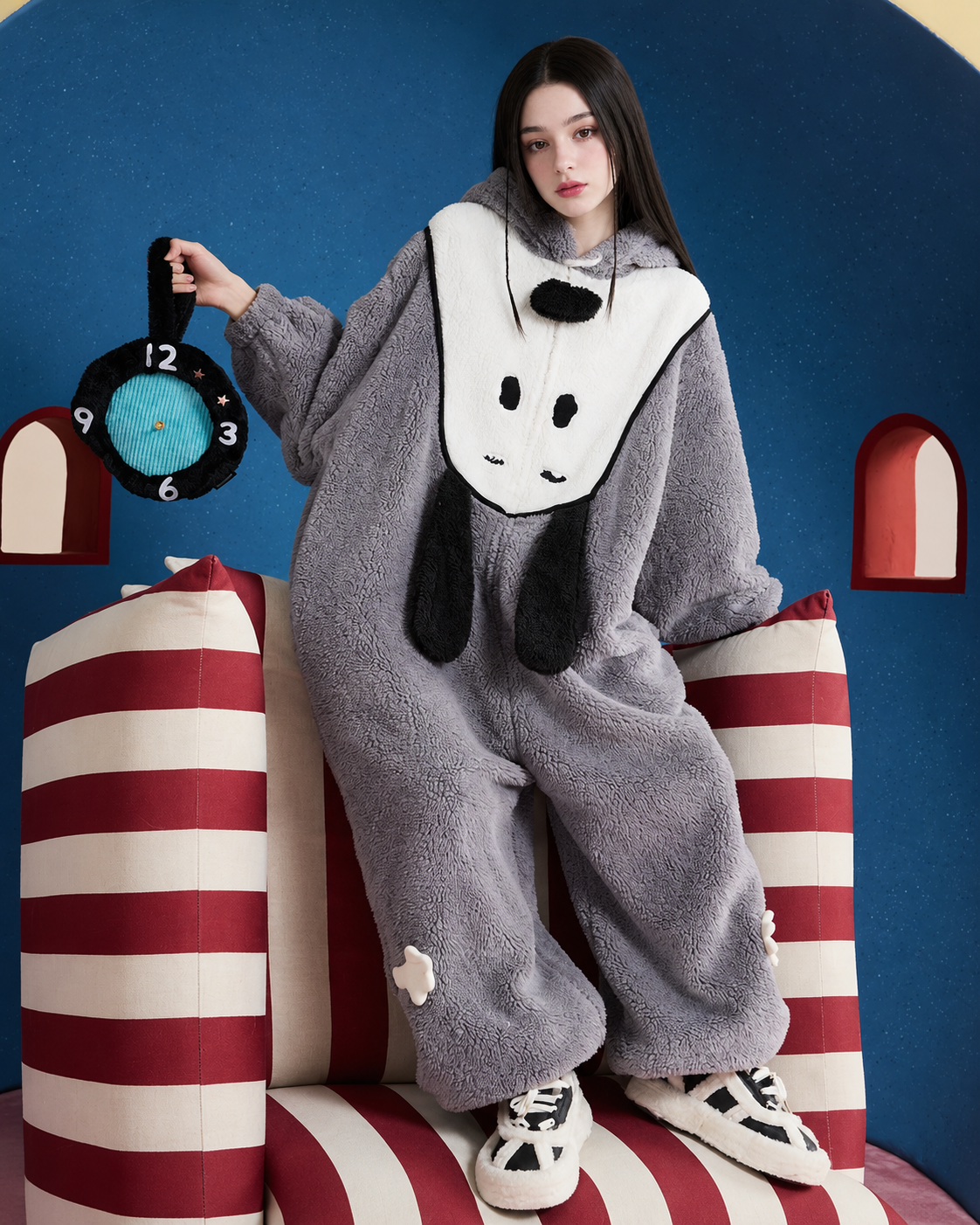 Dog-Face Hooded Fleece One-Piece Pajamas – gray seated view holding a soft clock - Roomden