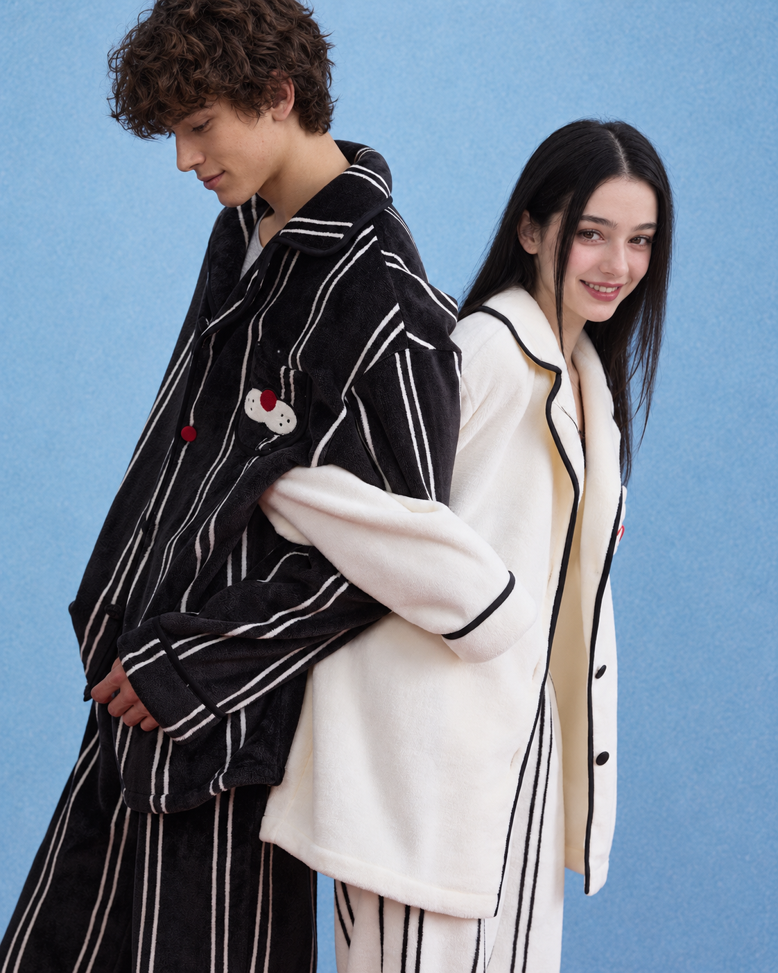 Men's Striped Cat-Pocket Fleece Pajama Set – Black, side view showing the striped top and pants - Roomden