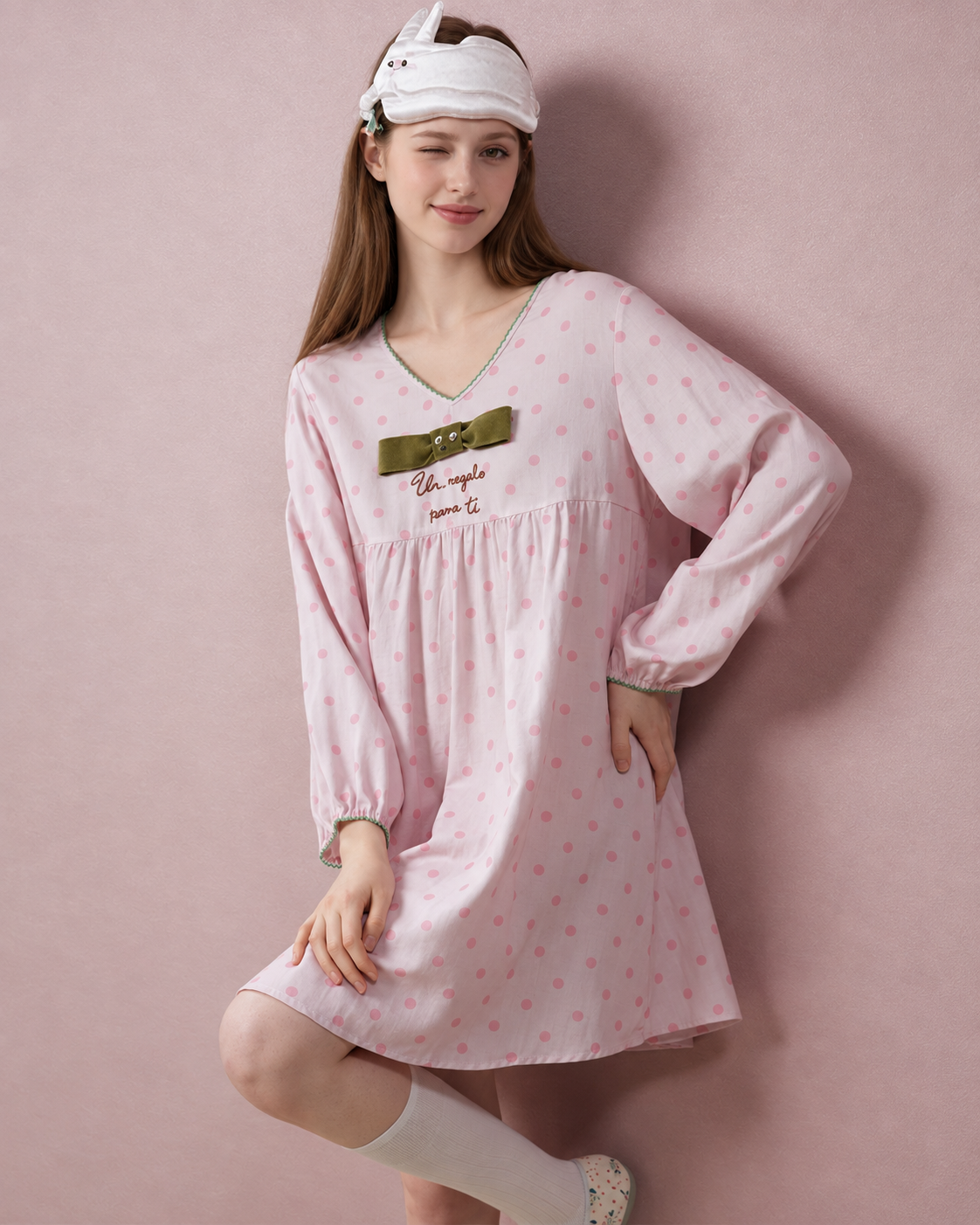Polka Dot Bow Cotton Gauze Pajama Set – pink top styled alone, leaning against a wall - Roomden