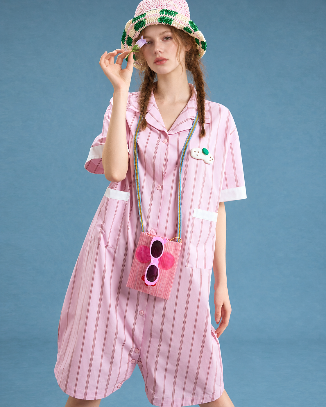 Striped cotton one-piece pajamas – pink front view with striped romper silhouette - Roomden