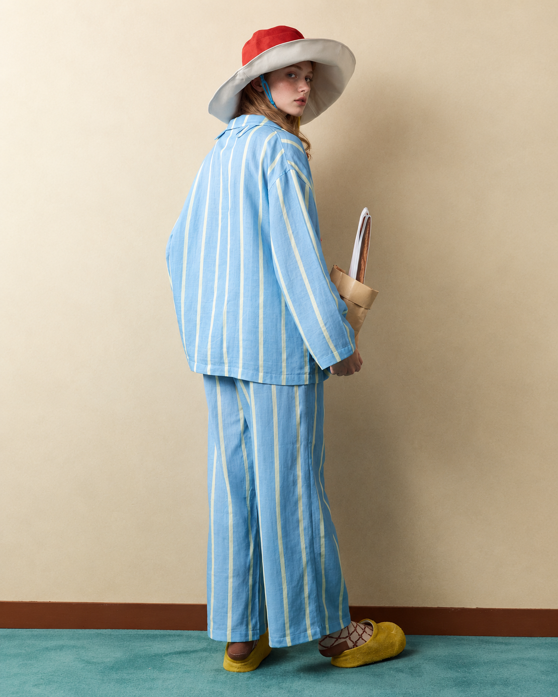 Striped Cotton Pajama Set – blue, yellow and white back view showing the long shirt and trousers - Roomden