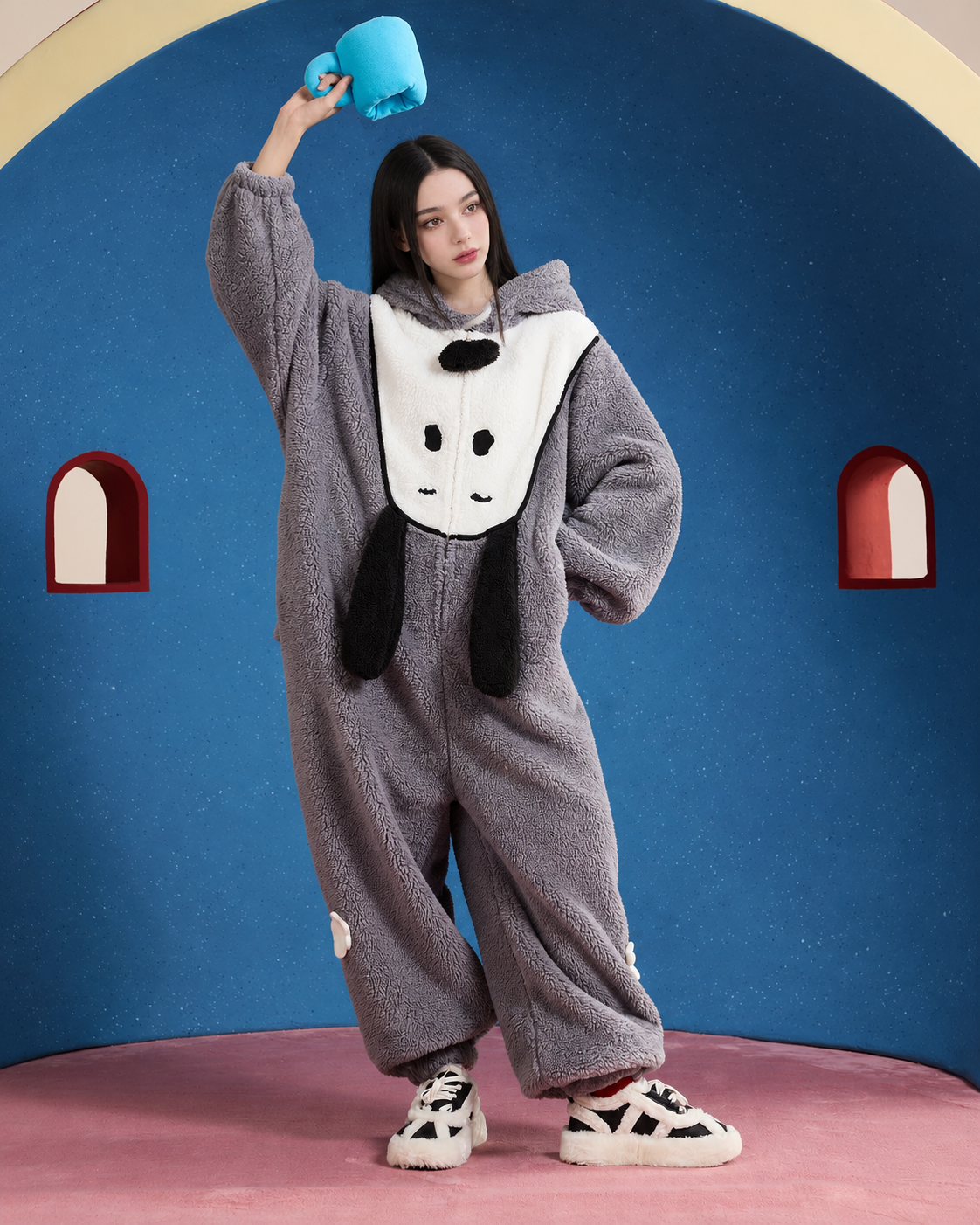 Dog-Face Hooded Fleece One-Piece Pajamas – gray raised-cup view with crossed feet - Roomden