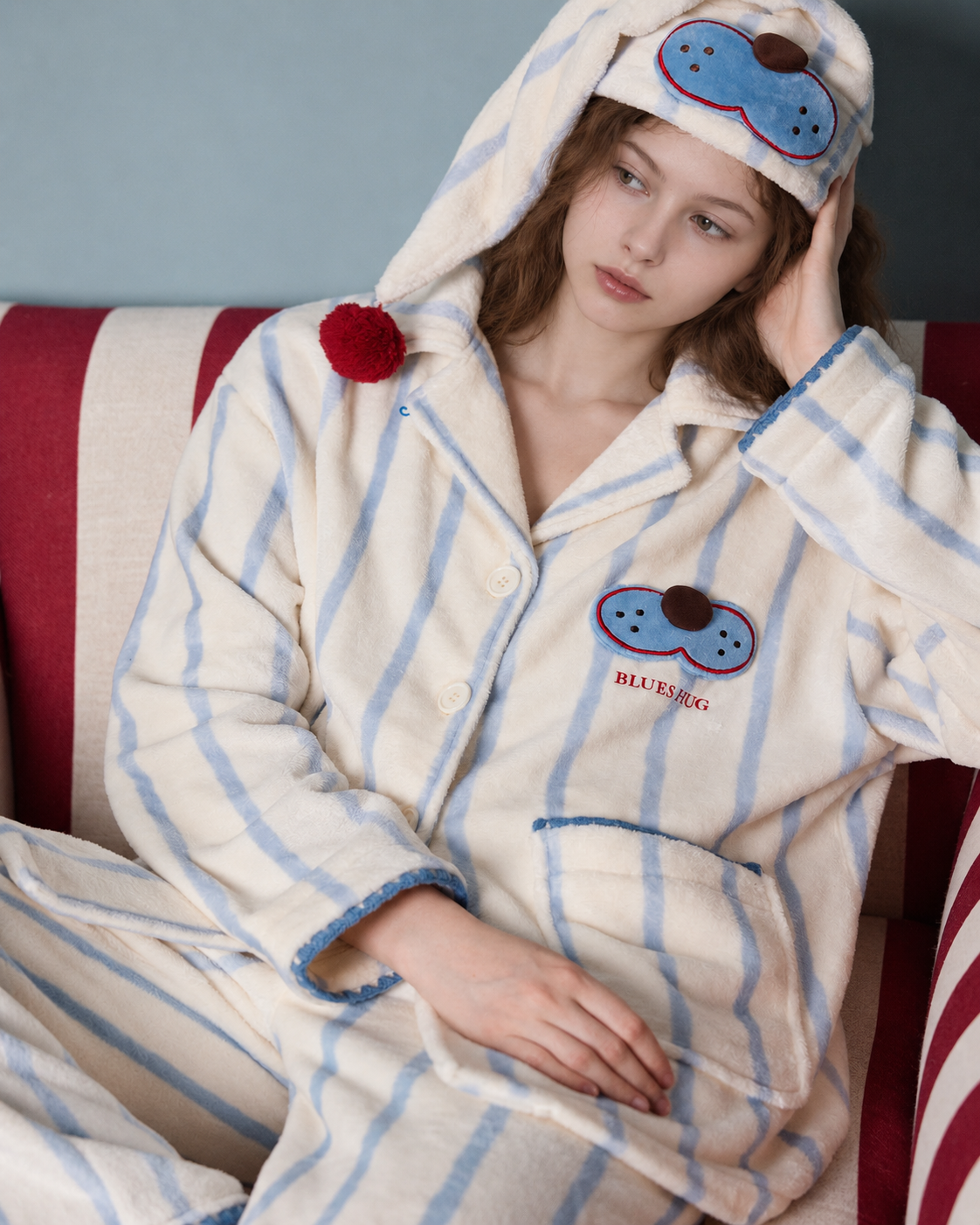 Striped Fleece Pajama Set – angled seated view of the button-front top - Roomden