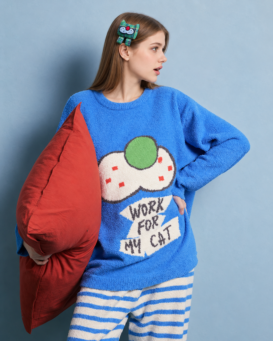 Blue cat graphic fleece pajama set with cream striped pants – Cat graphic close view with pillow