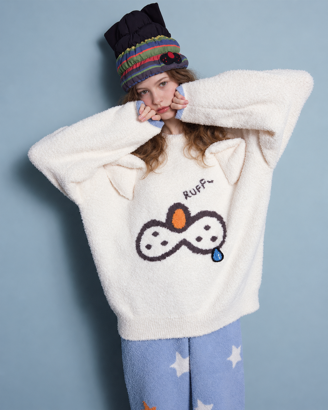 Cat & Star Plush Pajama Set – raised sleeves and close view of the cat graphic - Roomden