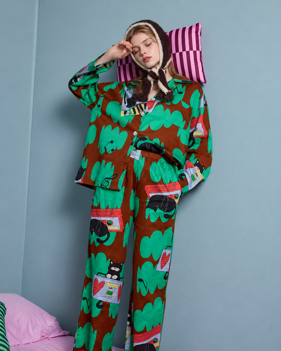 Cat Print Pajama Set – standing by a bed in the printed pajama set - Roomden