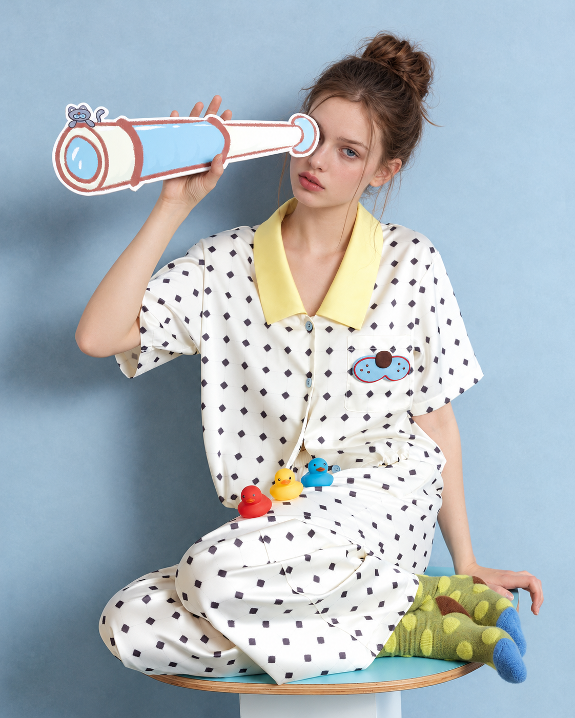 Lemonpause Short-Sleeve Pajama Set – ivory seated pose with a telescope prop - Roomden
