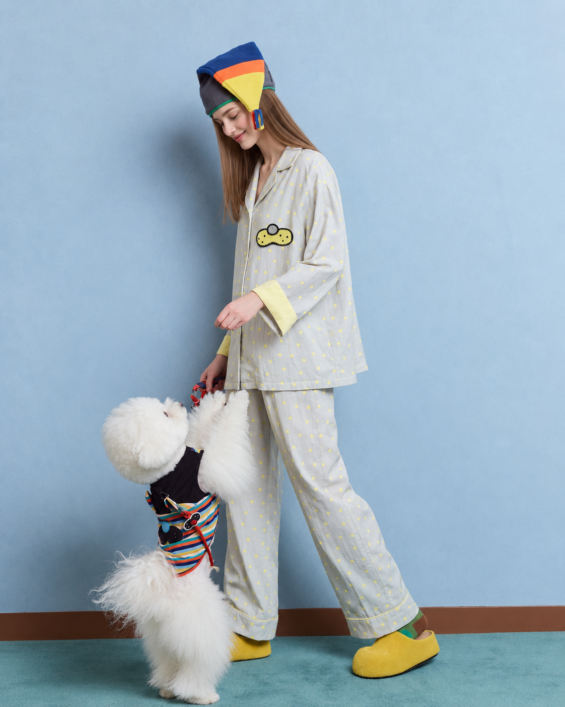 Women's gray and yellow dot cotton gauze pajama set – side view interacting with a dog - Roomden