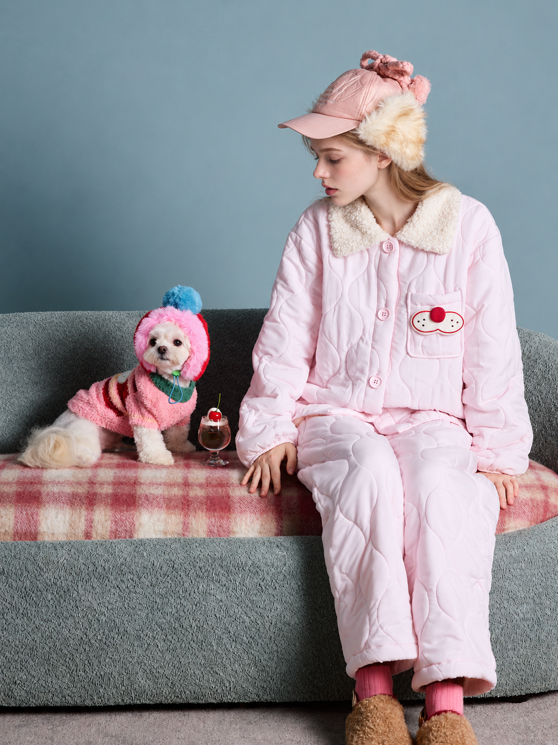 Cat Embroidery Quilted Pajama Set – pink seated on a sofa beside a dog - Roomden
