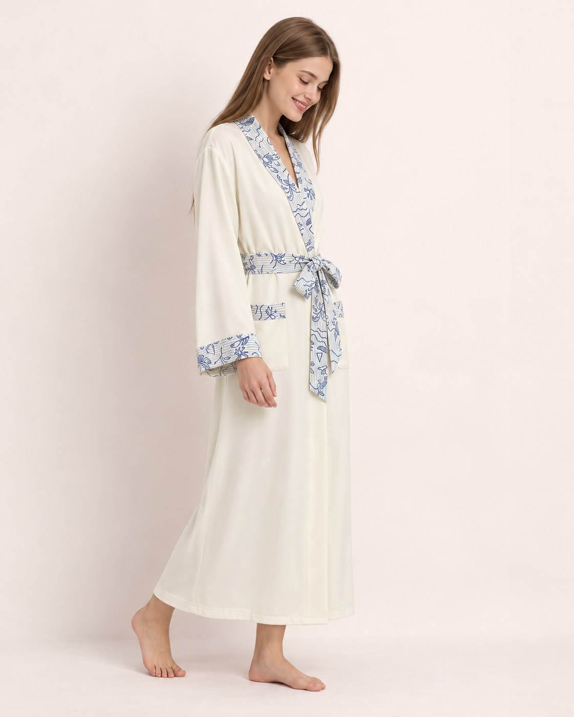 Apricot-cream Inkshore robe with blue botanical trim — studio view 3