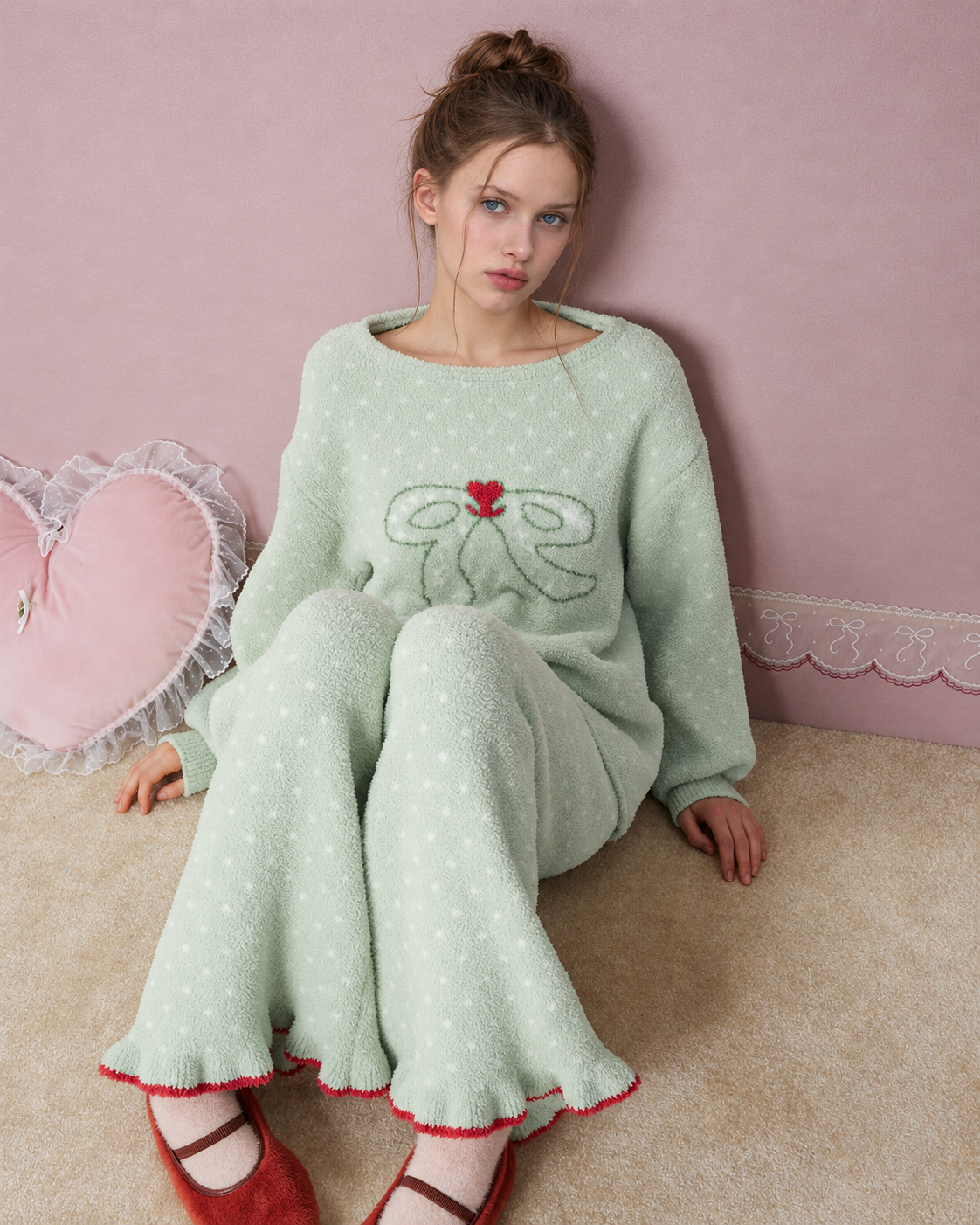 Bow and Heart Fleece Pajama Set – Apple green seated on the floor - Roomden