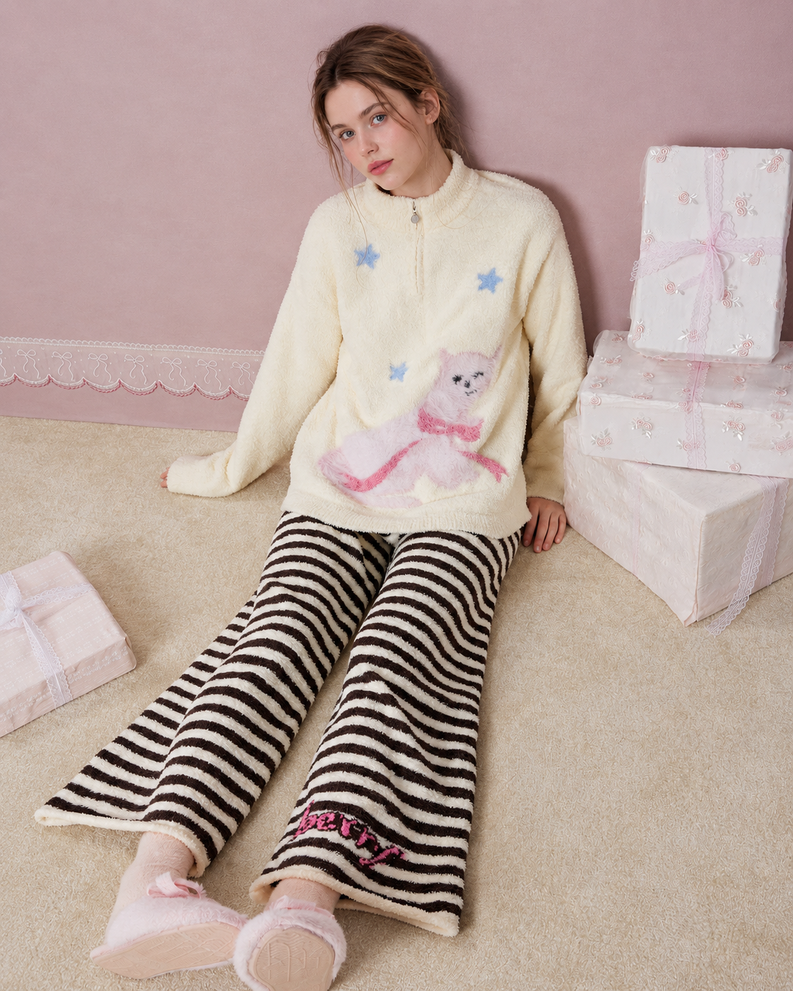 Full-length striped pajama trousers shown with legs extended - Roomden
