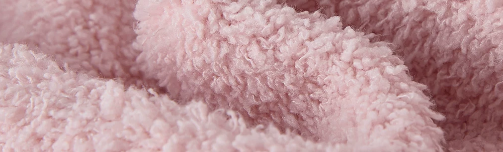 Blush Pink Plush Onesie – real plush fabric texture close-up - Roomden