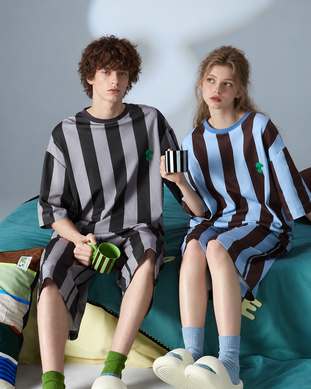 Cotton striped short-sleeve pajama set – Dark Gray Stripe, seated full outfit with cups - Roomden