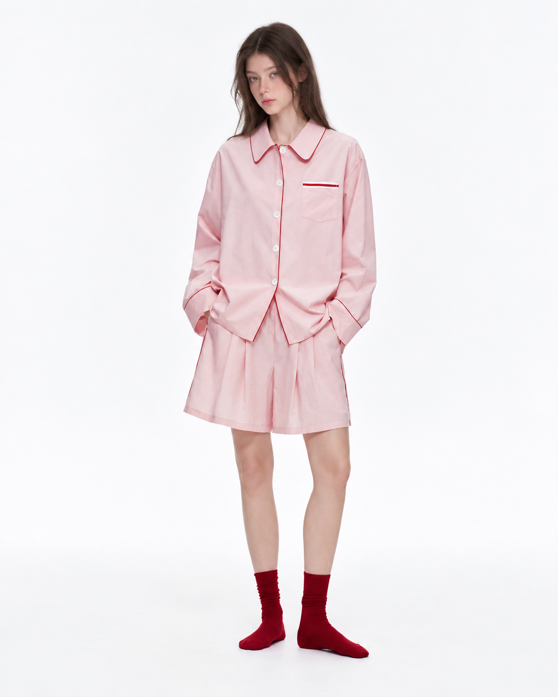 Linehaven contrast-piped pajama shorts set in pink, front view - Roomden
