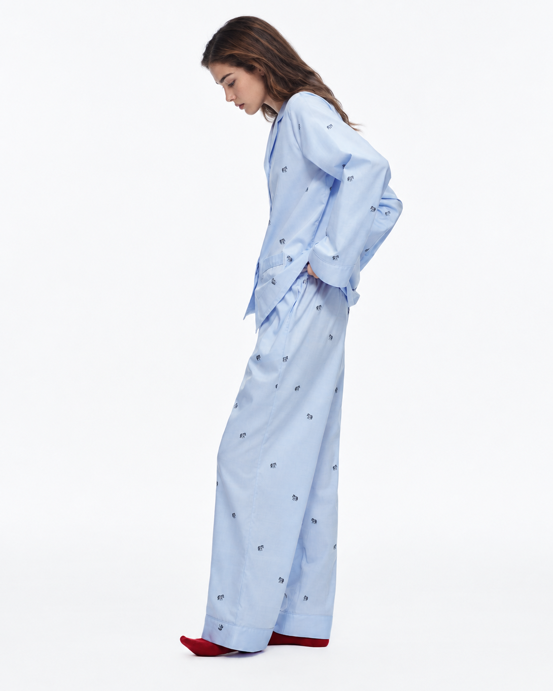 Animal-embroidered cotton pajama set in Sky Blue, side studio view - Roomden