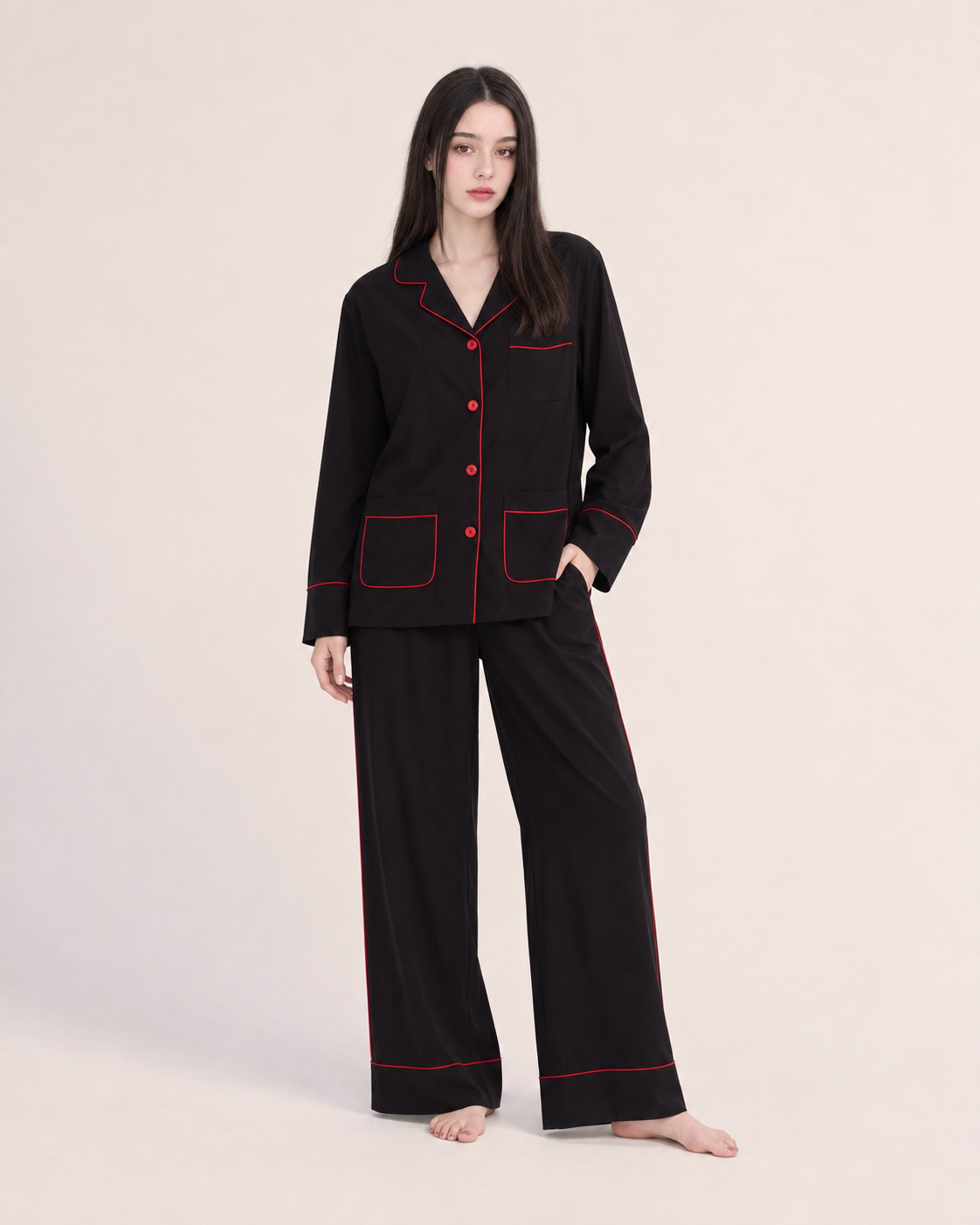 Linehaven contrast-piped pajama set in black, front view - Roomden