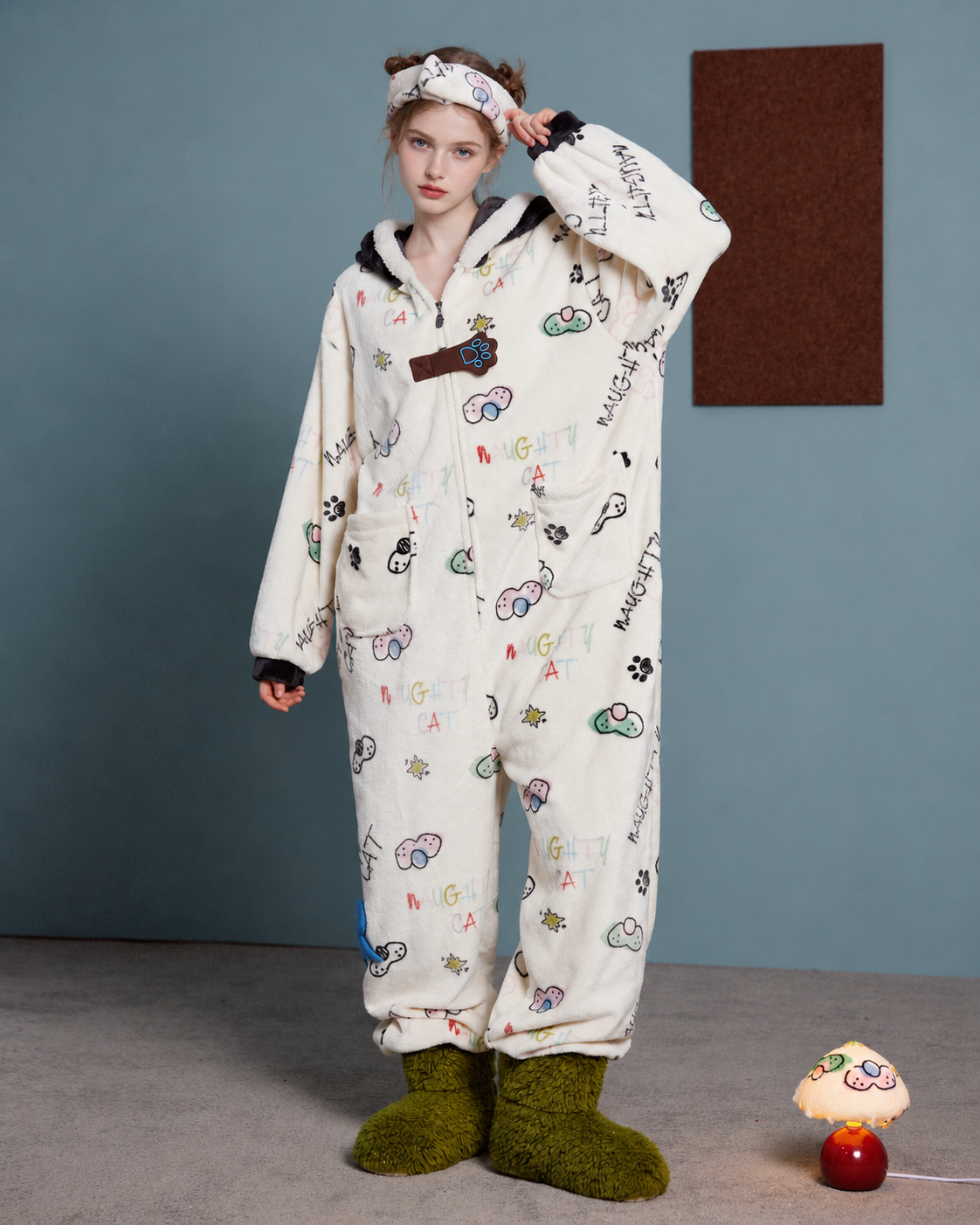 Doodlewhisk Cat-Doodle Hooded One-Piece Pajamas – front view with raised hand - Roomden