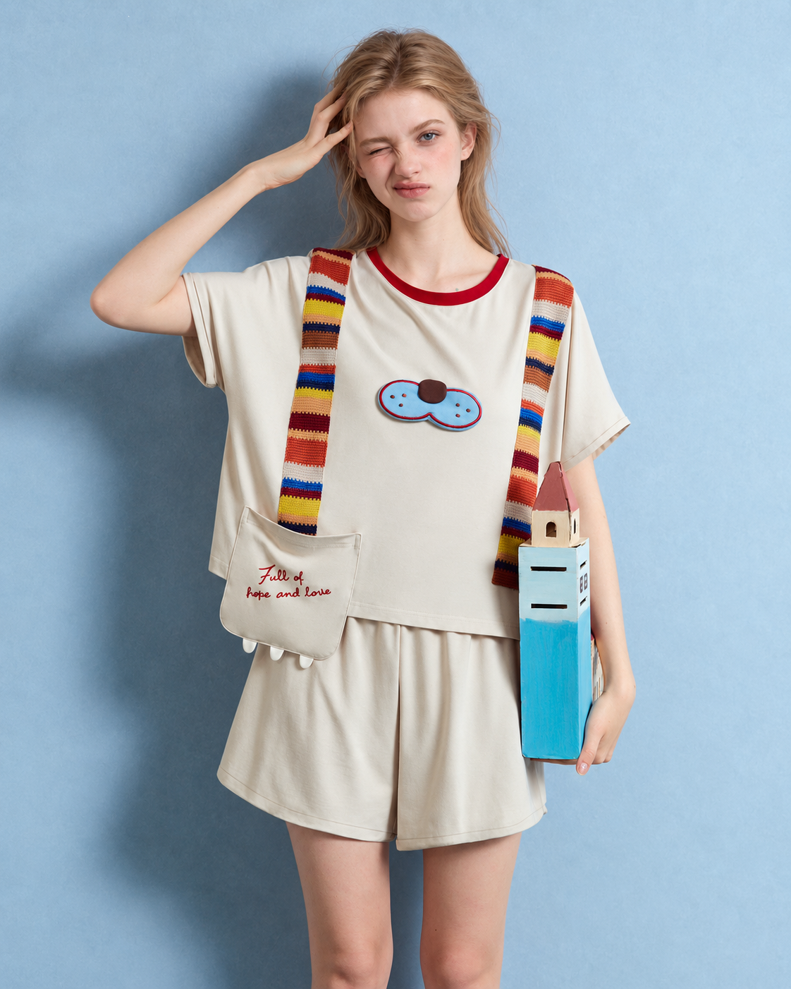 Cat Motif Cotton-Blend Short Pajama Set – grey-apricot raised-hand pose holding a building prop - Roomden