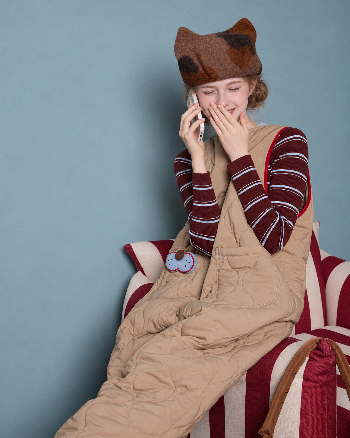 Cat Pocket One-Piece Pajamas – seated phone moment and pocket detail - Roomden
