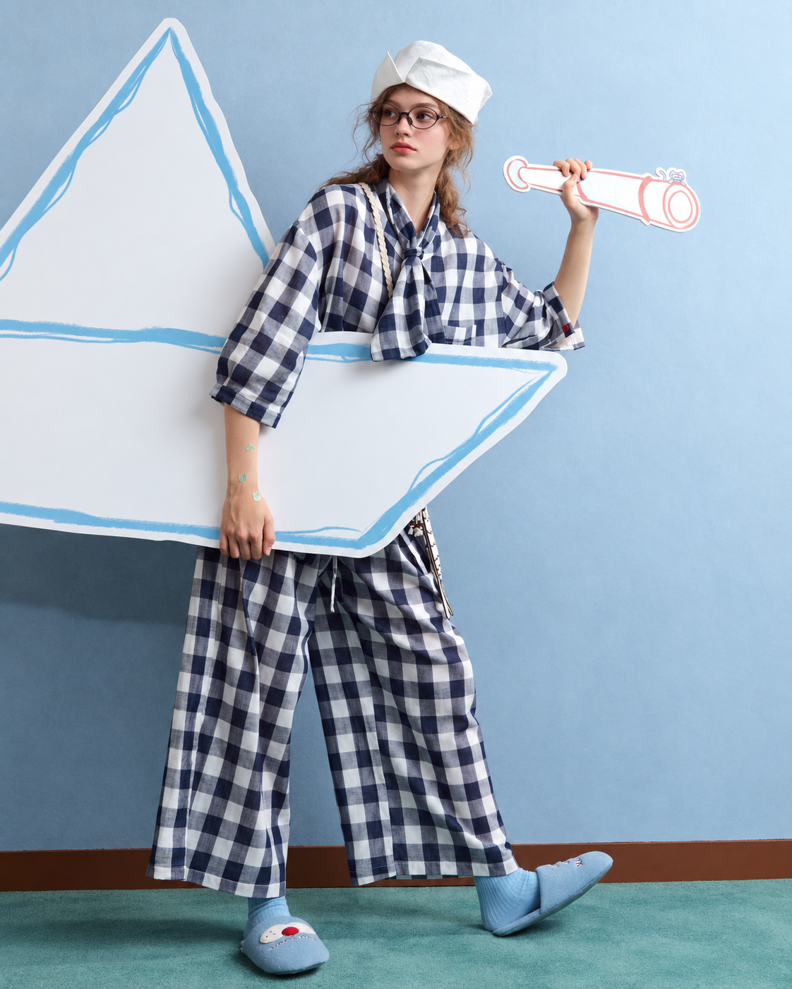 Cotton Double Gauze Pajama Set – navy checks, standing view with paper boat prop - Roomden
