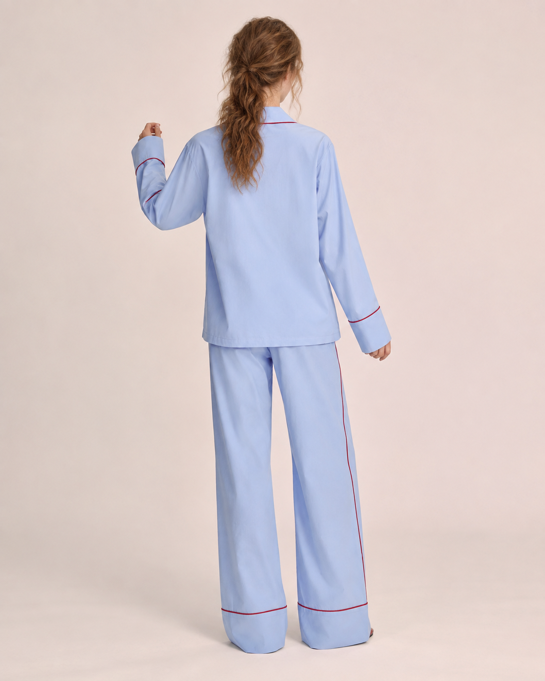 Linehaven contrast-piped pajama set in blue, back view - Roomden