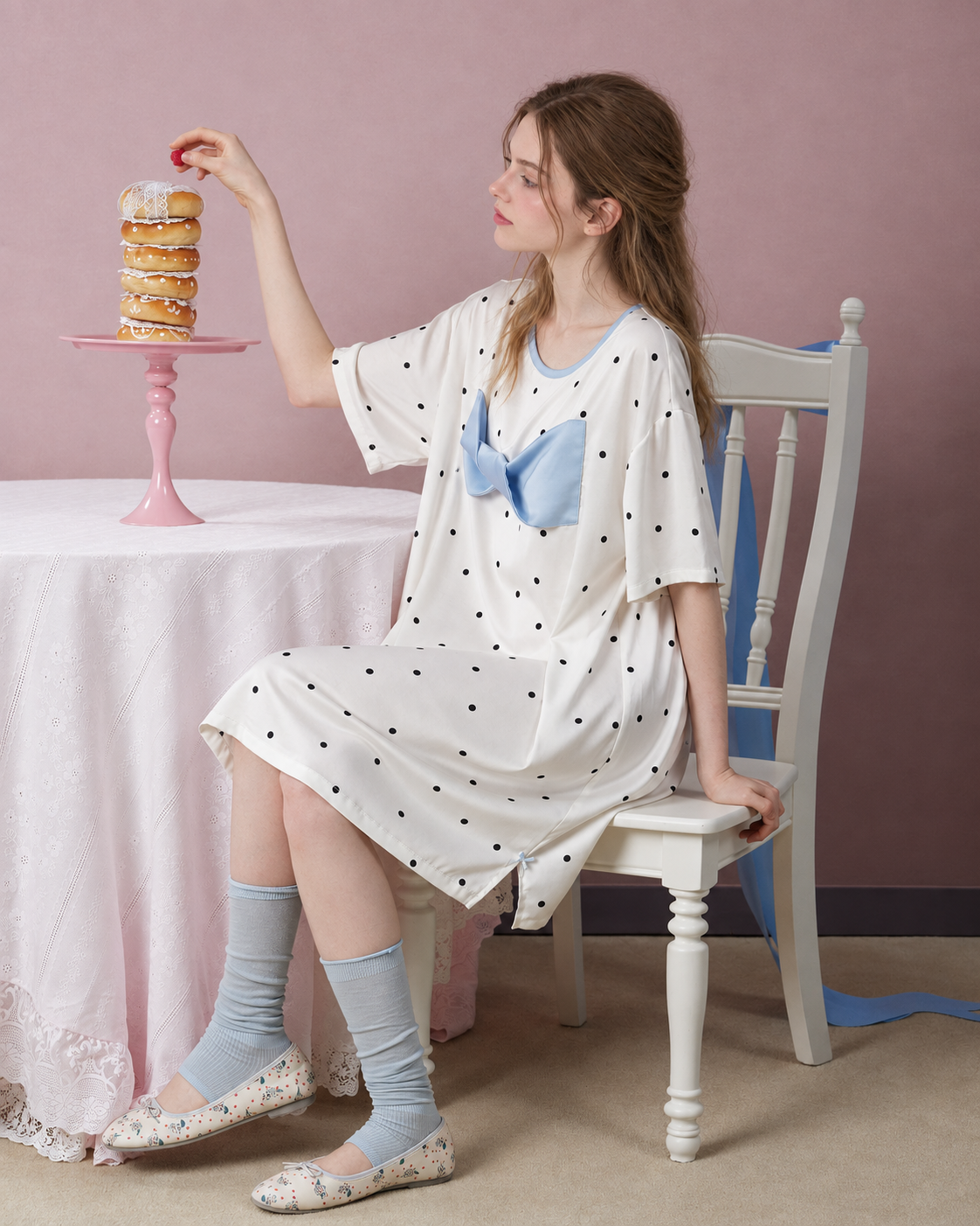 Blue Bow Polka Dot Nightgown – ivory nightgown seated beside a dessert table - Roomden
