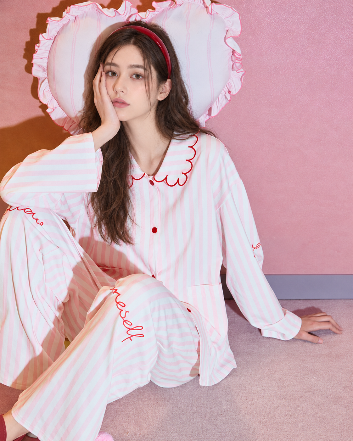 Scalloped Stripe Cotton Pajama Set – bent-knee seated pose with a pink cushion - Roomden