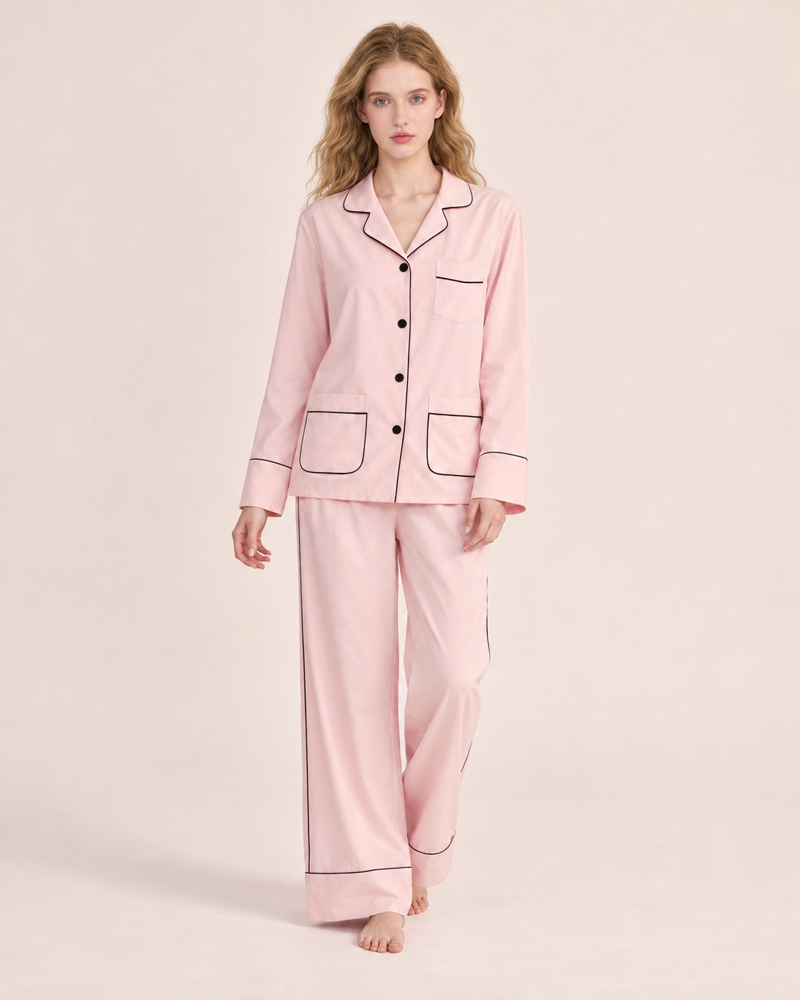 Linehaven contrast-piped pajama set in pink, front view - Roomden