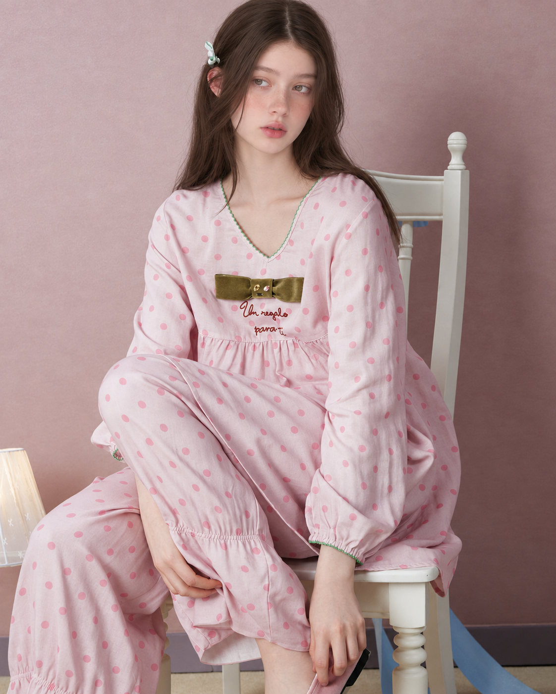 Polka Dot Bow Cotton Gauze Pajama Set – pink set, seated with raised knee - Roomden