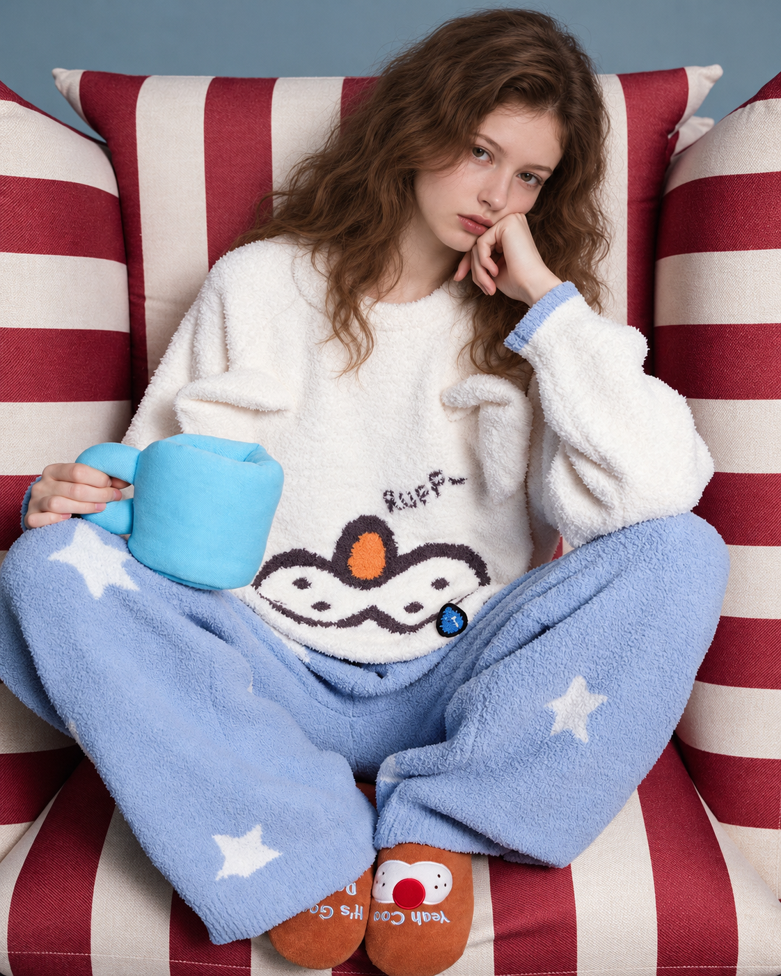 Cat & Star Plush Pajama Set – cross-legged pose showing the blue star trousers - Roomden