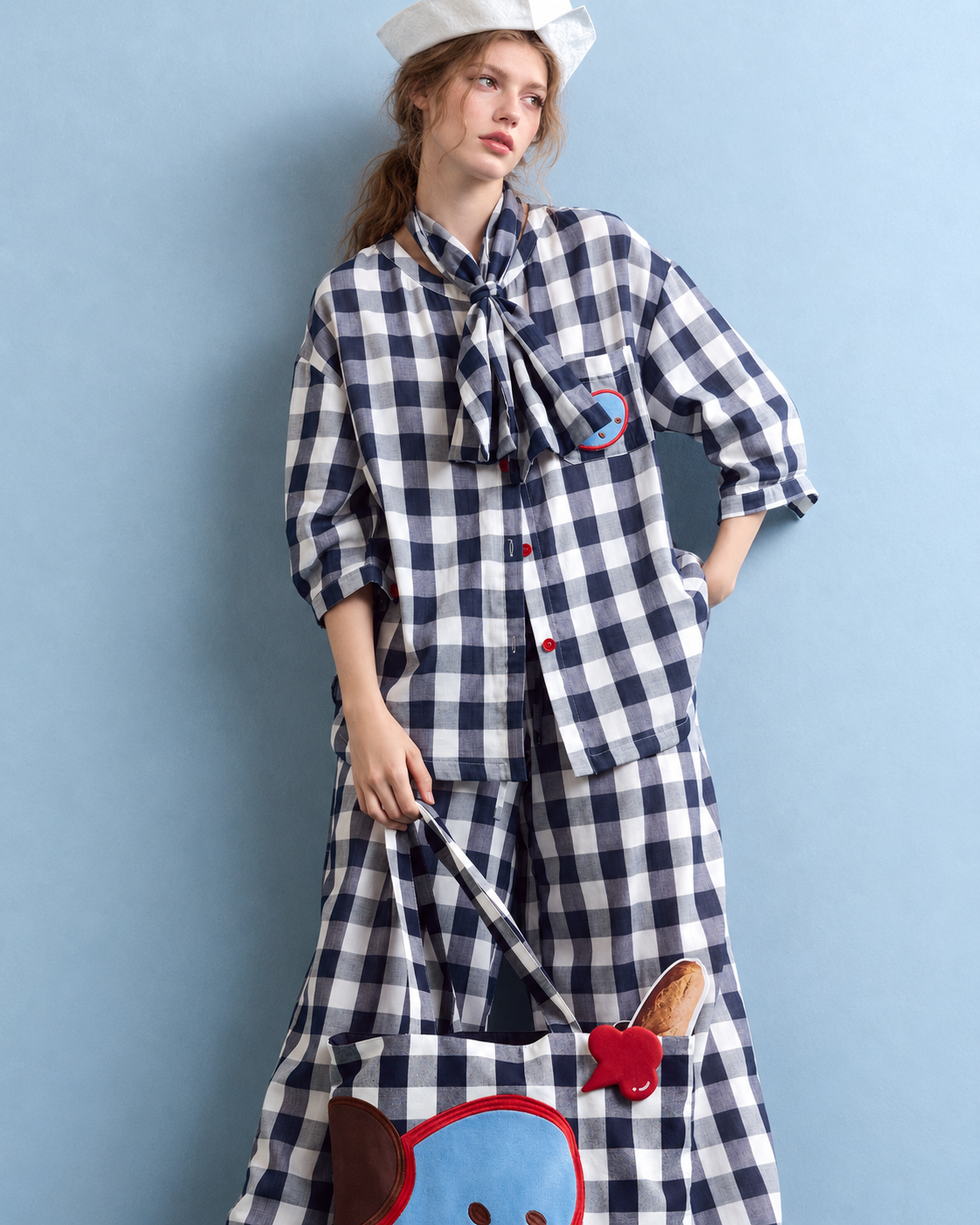 Cotton Double Gauze Pajama Set – navy checks, front view with a checked tote prop - Roomden