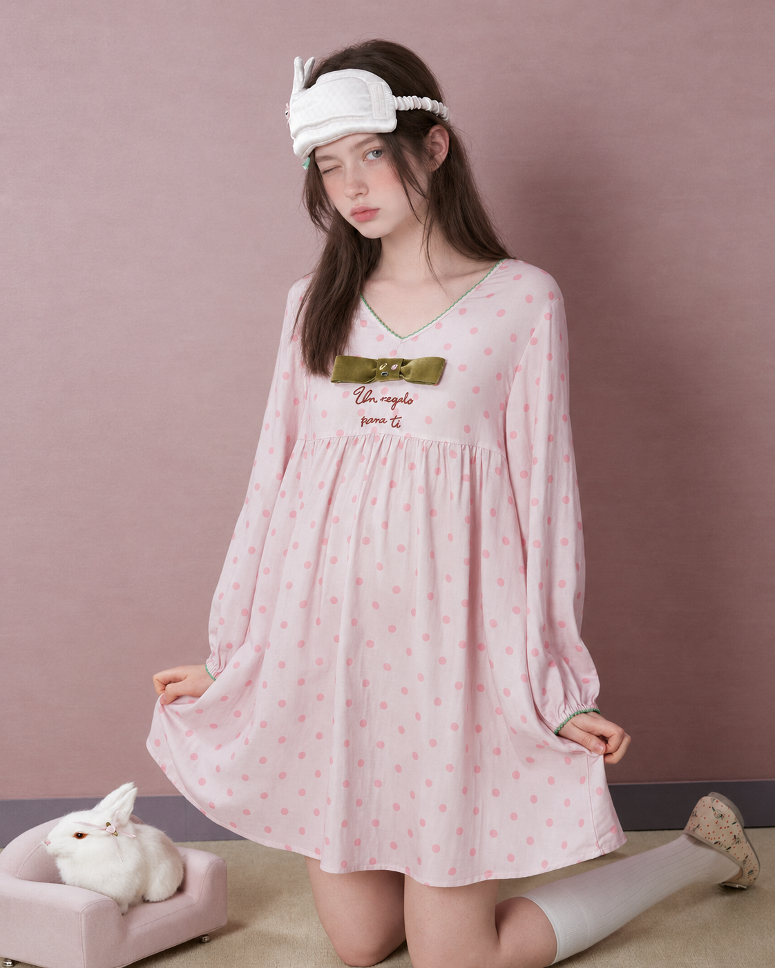 Polka Dot Bow Cotton Gauze Pajama Set – pink top styled alone, kneeling with sleep mask - Roomden
