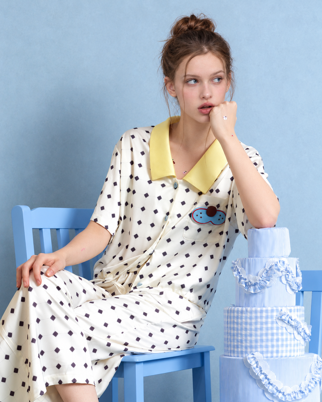 Lemonpause Short-Sleeve Pajama Set – ivory seated view showing the blue cat pocket - Roomden