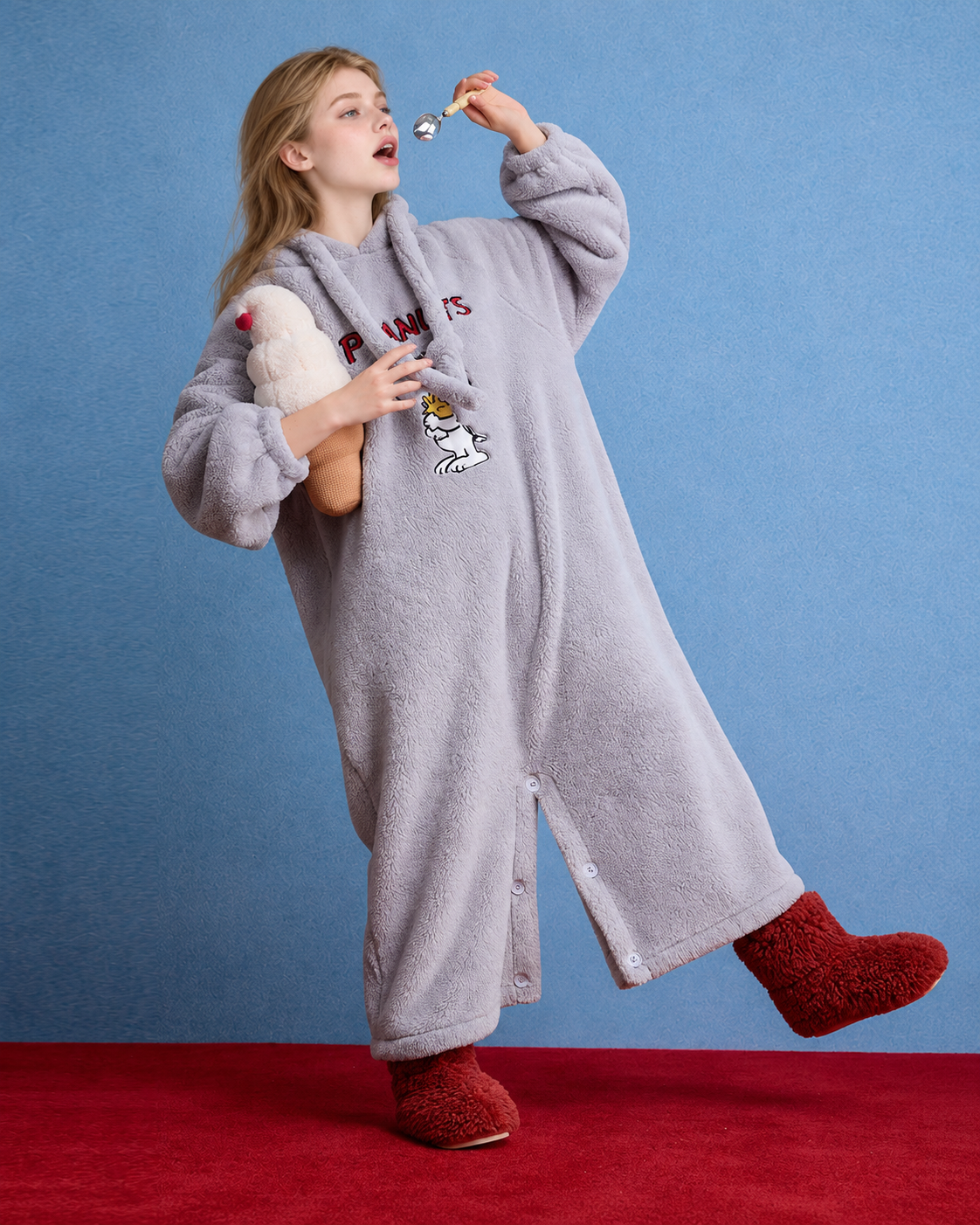 Snoopy hooded fleece one-piece pajamas – light gray raised-leg pose with lower buttons - Roomden