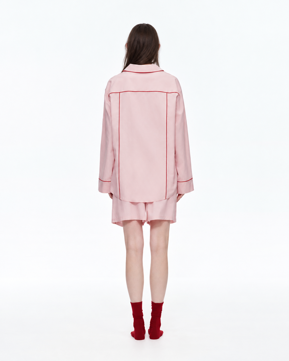 Linehaven contrast-piped pajama shorts set in pink, back view - Roomden
