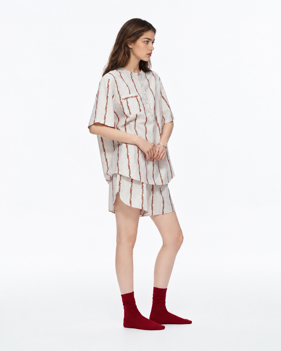 Roseledger cream cotton pajama shorts set with red floral stripes, three-quarter view - Roomden