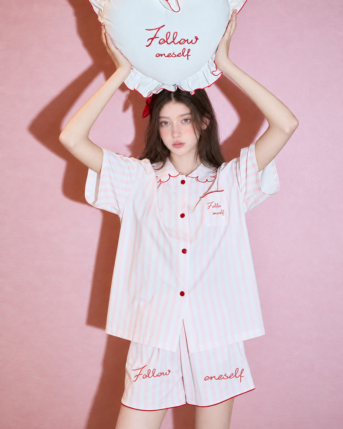 Scalloped collar striped cotton pajama set – pink and white, overhead cushion pose - Roomden