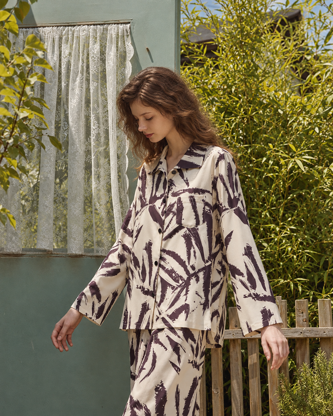 Brushstroke Palm Viscose-Rayon Pajama Set – standing by a garden door - Roomden