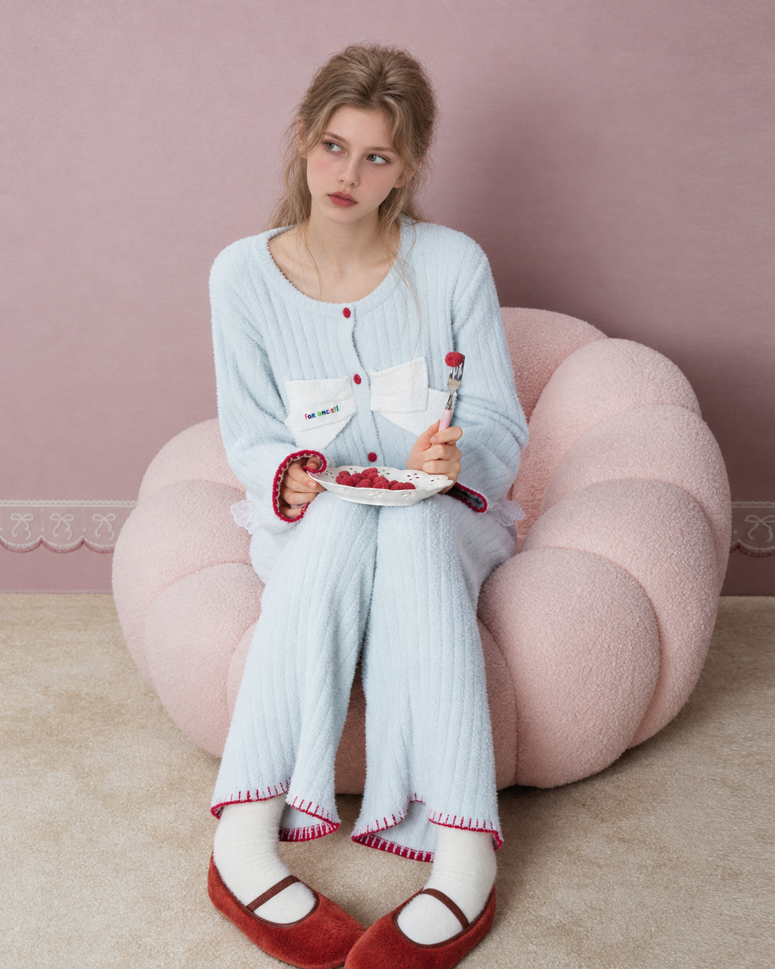 Bow-Front Textured Pajama Set – water blue set worn seated while holding a berry plate - Roomden