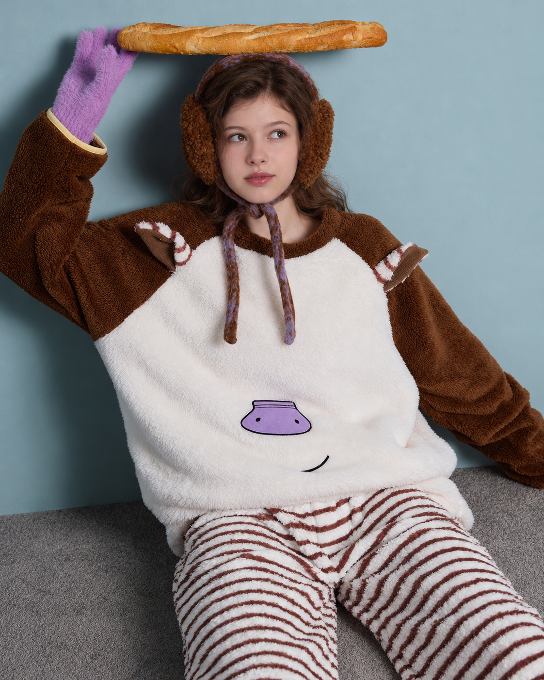 Horse-Ear Flannel Pajama Set – seated view with a bread prop - Roomden