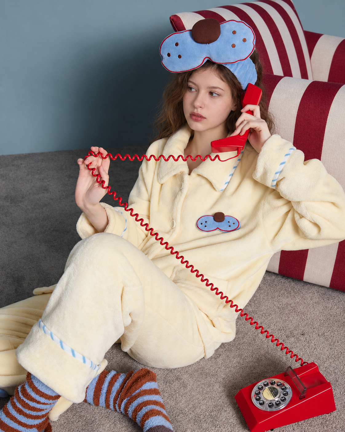 Cat Patch Fleece Pajama Set – cream yellow, seated view with striped sleeve edging - Roomden