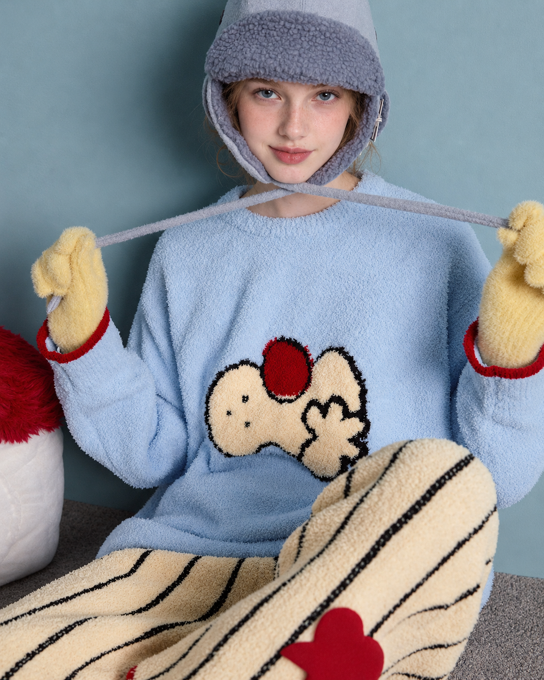 Cat Motif Plush Pajama Set – close seated view of the plush cat top and striped pants - Roomden