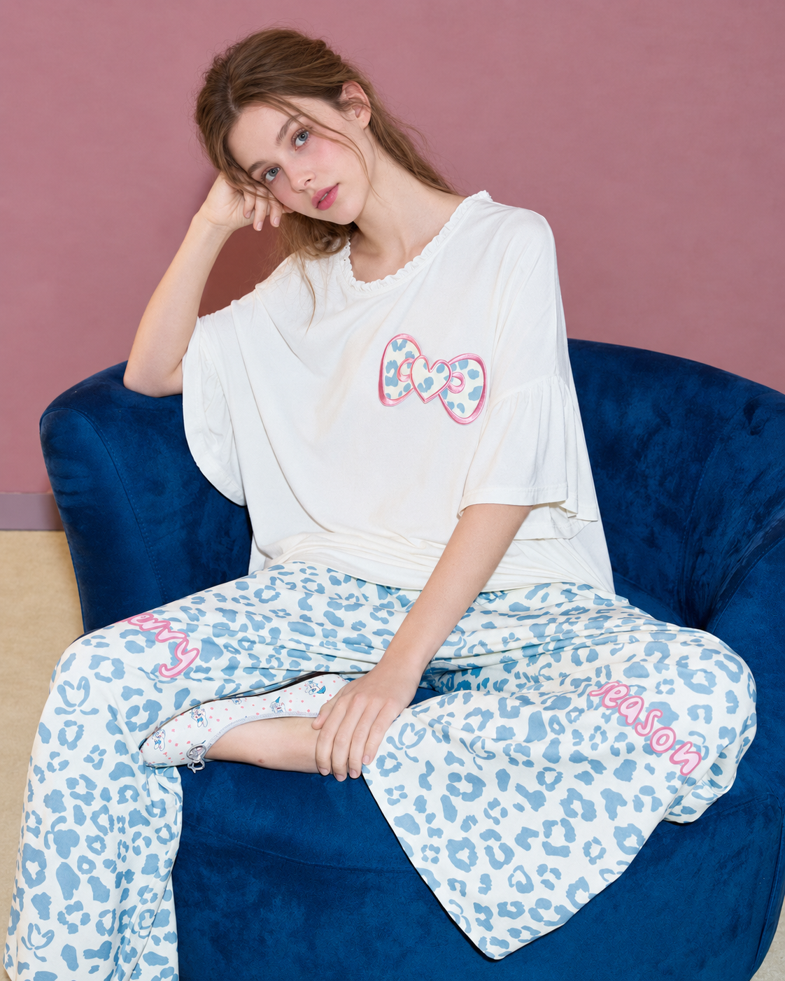 Heart Bow Cotton Blend Pajama Set – cross-legged on a blue chair - Roomden