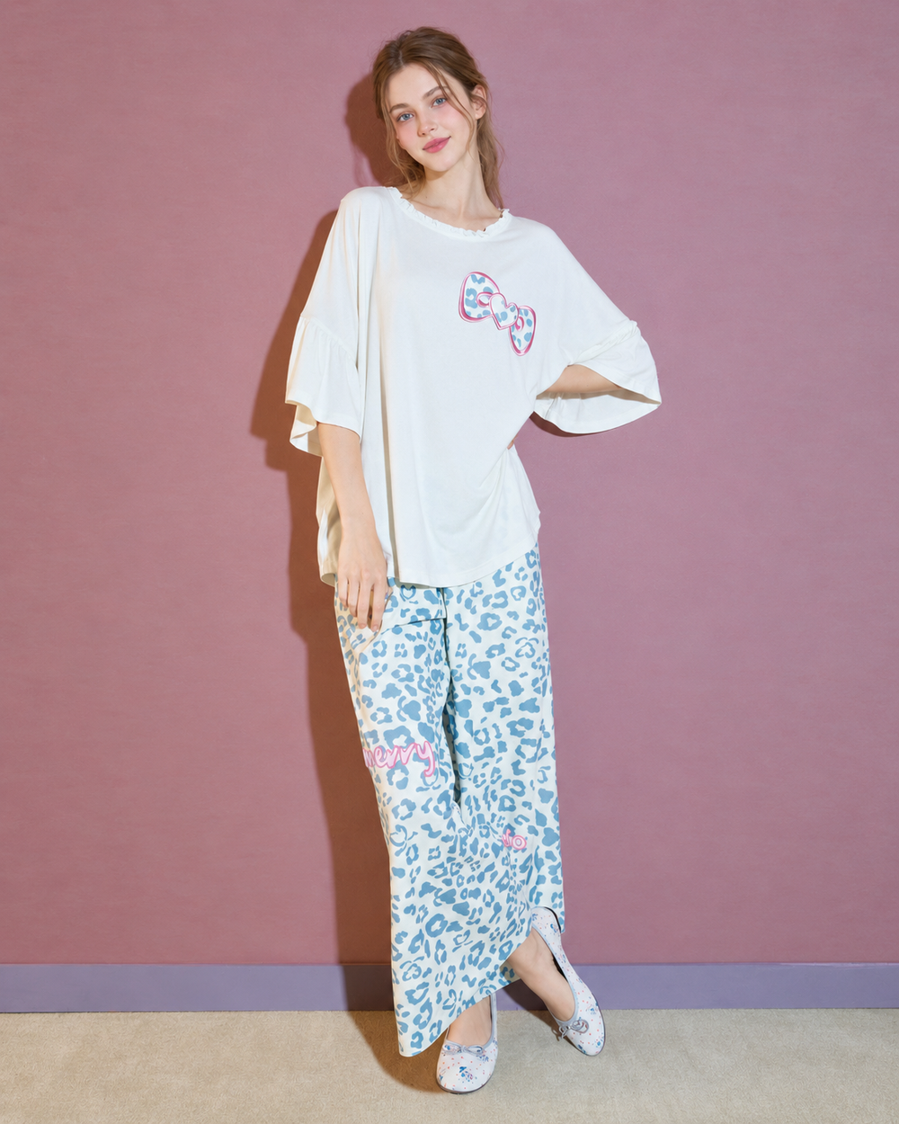 Heart Bow Cotton Blend Pajama Set – front standing view with one hand on hip - Roomden