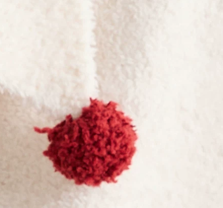 Pom-Pom Fleece Pajama Set – ivory close-up of red collar pom-pom and ivory fleece - Roomden