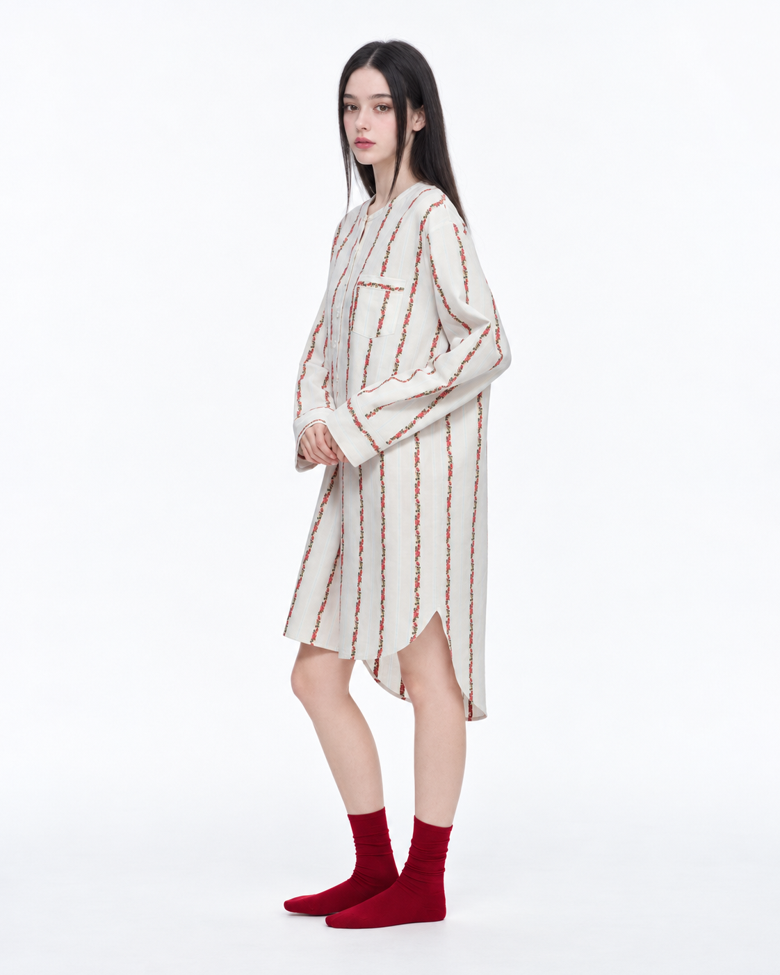 Roseledger cotton nightgown – Cream Rose Stripe, side view showing the curved hem - Roomden